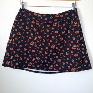 ONZIE LEOPARD PRINT TENNIS SKORT SIZE LARGE